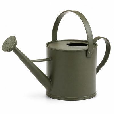 Green watering can on a white background